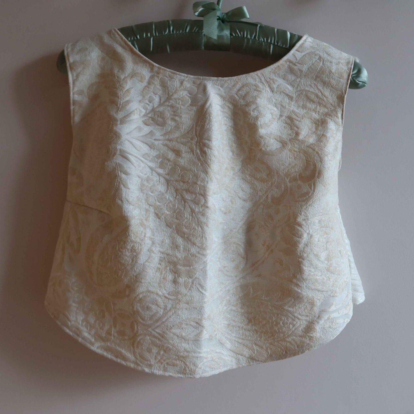 Front view of CrossBack Halter Top made from upcycled cotton with intricate floral patterns, perfect for sustainable fashion lovers. upcycled cotton crossback halter top