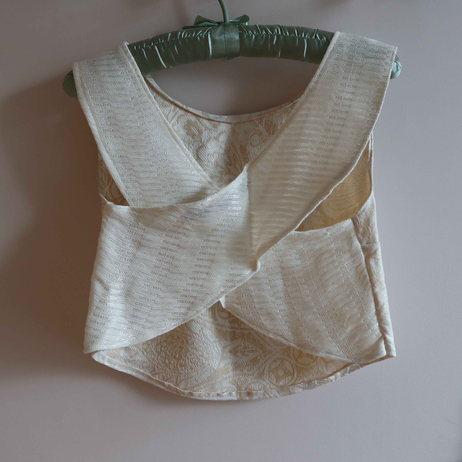 Back view of CrossBack Halter Top featuring a stylish crisscross design, crafted from eco-friendly upcycled cotton fabric. upcycled cotton crossback halter top